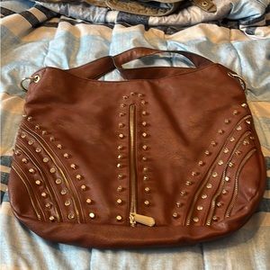 Brown, large, leather and like new never used
